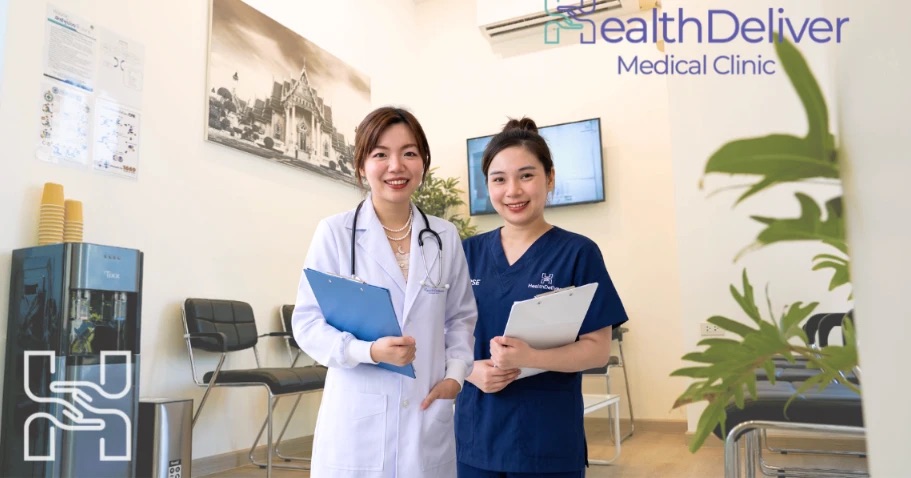 Doctor and nurse at HealthDeliver Asoke clinic, Bangkok